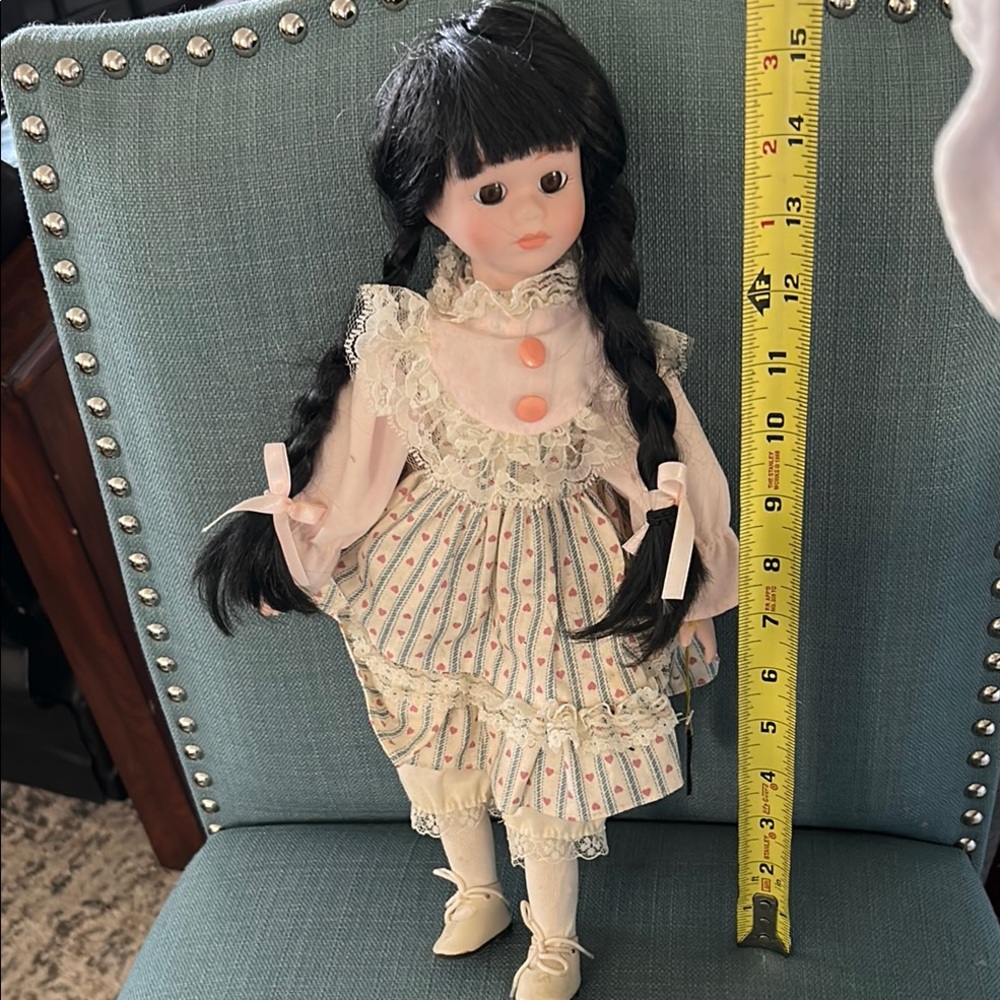 Classic Black-Haired Porcelain Doll